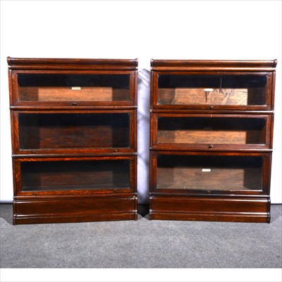 Lot 541 - A pair of oak three sectional bookcases, ...