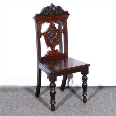 Lot 559 - An Edwardian stained walnut hall chair,...