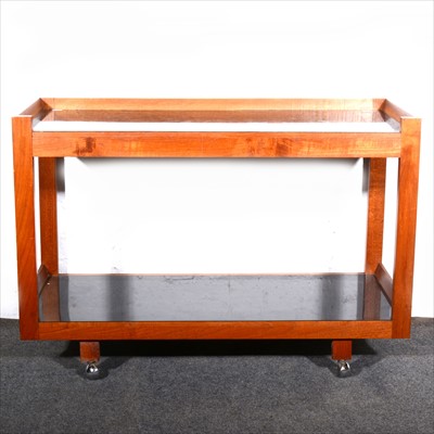 Lot 523 - A Danish teak and black laminate two-tier trolley, circa 1965