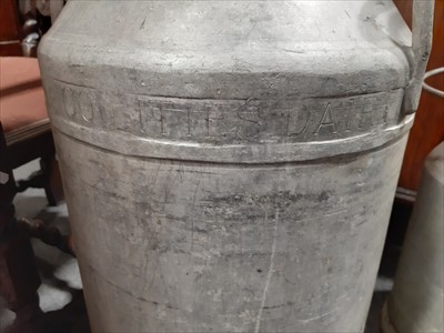 Lot 176 - Two vintage milk churns