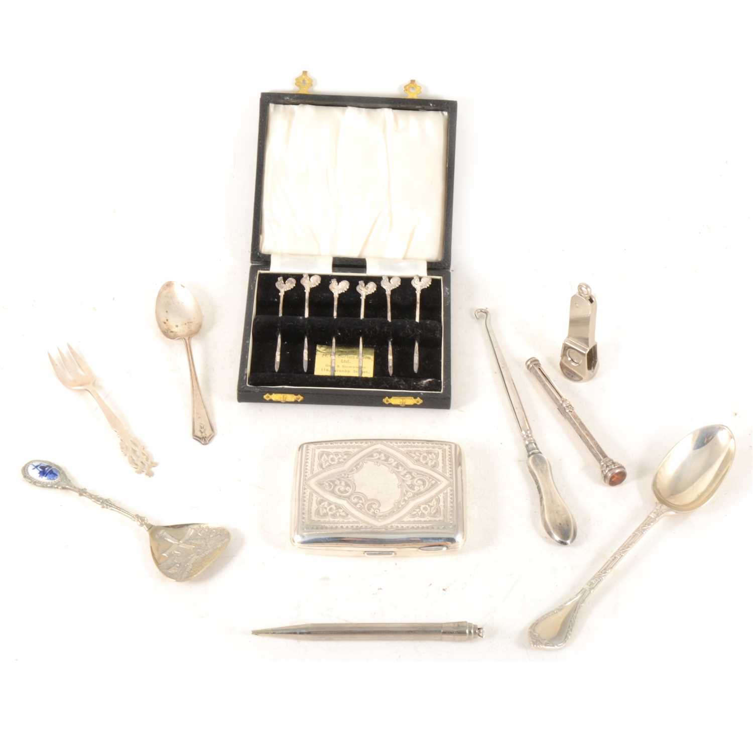 Lot 133 - A silver cigarette case, cocktail sticks, plated cigar cutter and other small silver and plated items.
