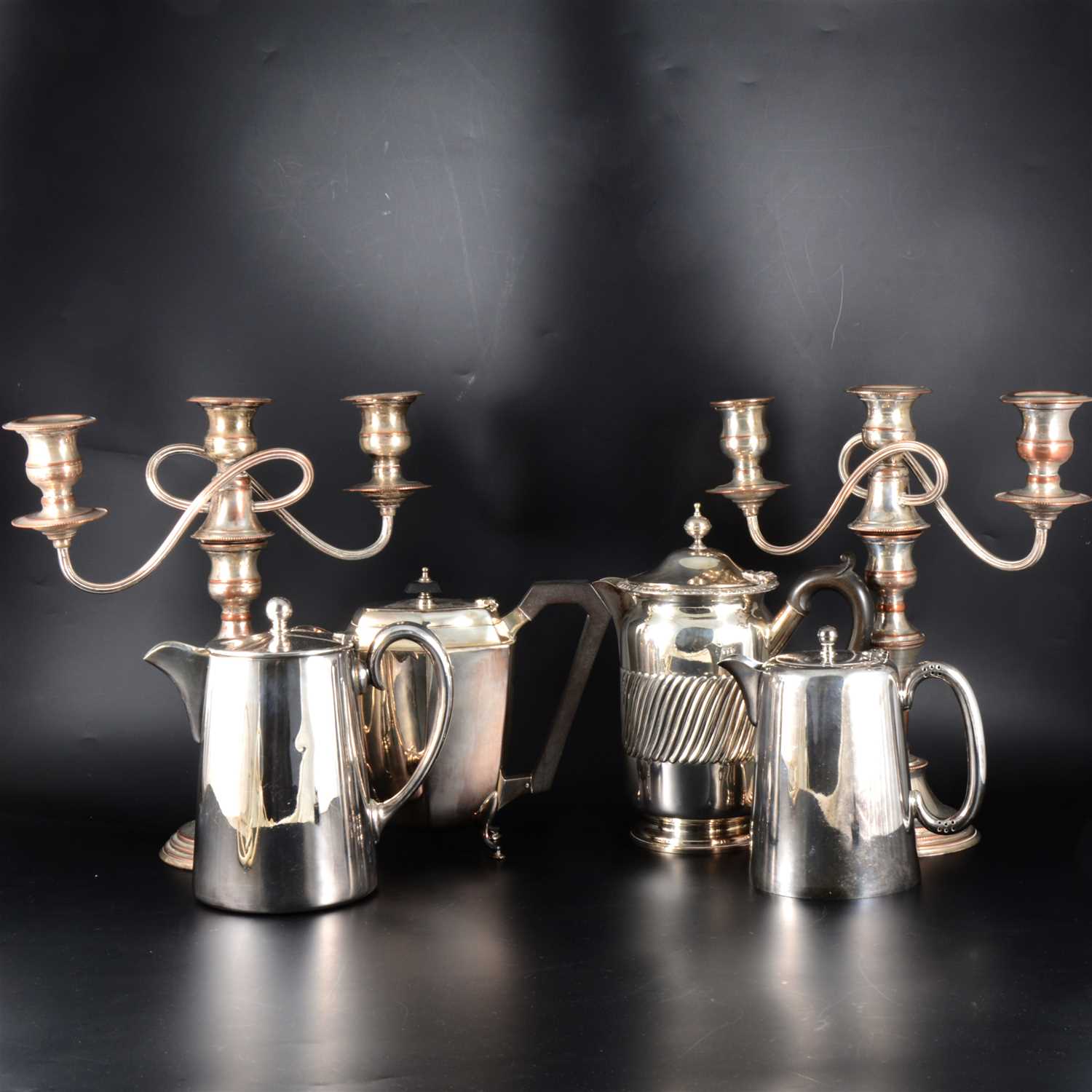 Lot 47 - A pair of silver-plated three-light table candelabra, ...