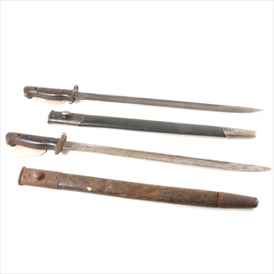 Lot 133 - Two Remington 1913 Pattern bayonets, with scabbards, one with leather frog.