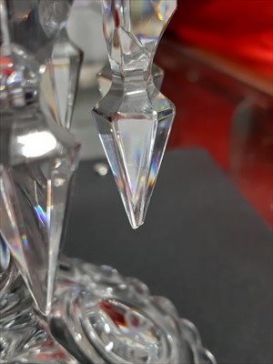 Lot 18 - A pair of Baccarat glass candlesticks with ten prism lustres, marked on base.