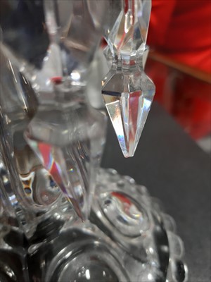 Lot 18 - A pair of Baccarat glass candlesticks with ten prism lustres, marked on base.