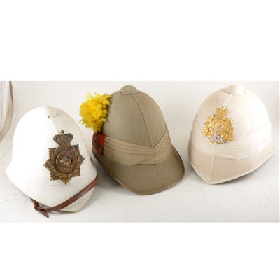 Lot 269 - A Leicestershire Regiment tropical helmet and two other tropical helmets.