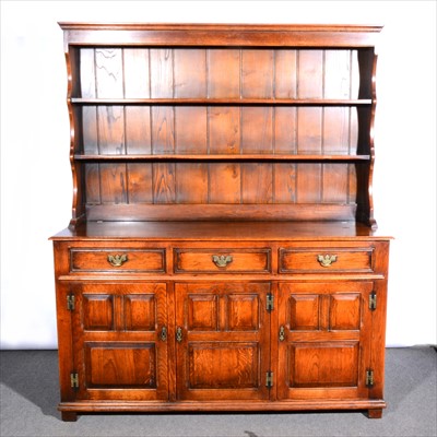 Lot 505 - A reproduction oak dresser, ...