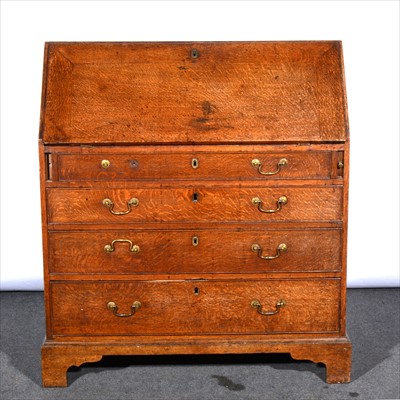 Lot 486 - A George III oak bureau