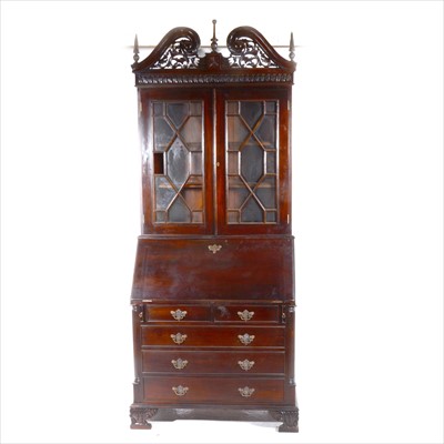 Lot 411 - A George II style hardwood bureau bookcase