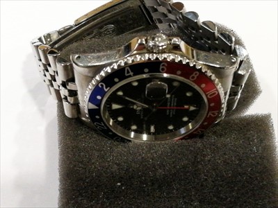 Lot 722 - Rolex - a gentleman's GMT Oyster Perpetual Date GMT Master wrist watch with "Pepsi" bezel