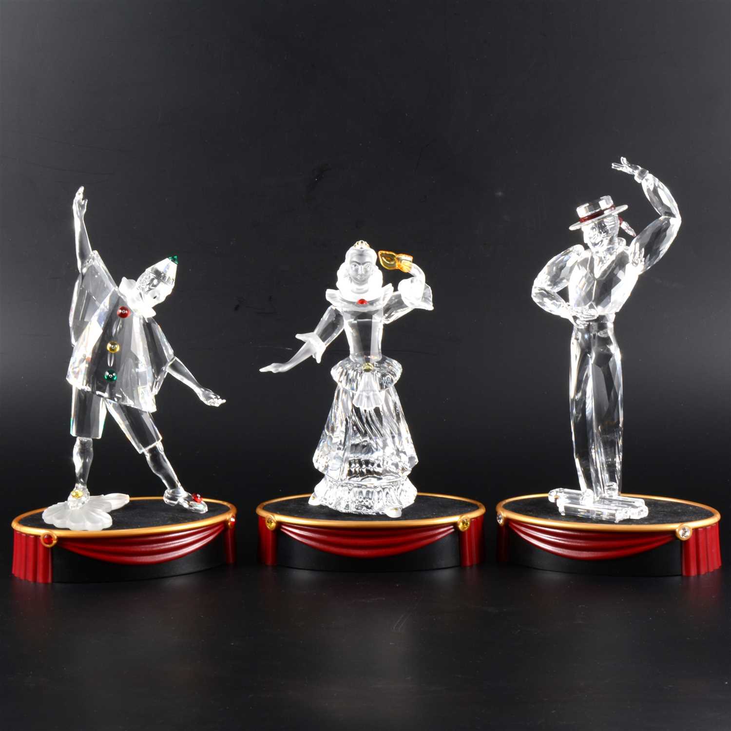 Lot 20 - Two Swarovski 'Masquerade' limited edition figures, and another.