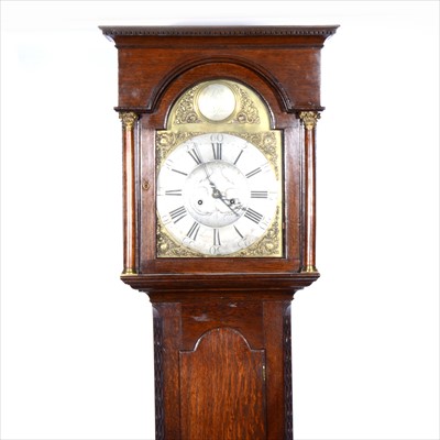 Lot 510 - An oak longcase clock, arched brass dial...