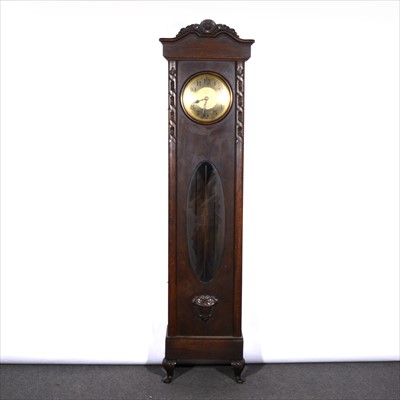 Lot 511 - An oak longcase clock