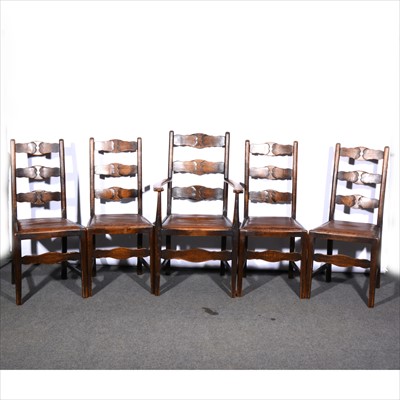 Lot 583 - A set of five oak dining chairs, backs with...