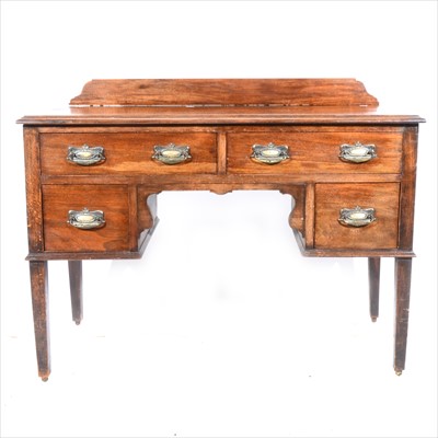 Lot 411 - An Edwardian mahogany writing table