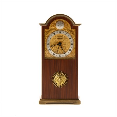 Lot 144 - A gilt metal and enamelled miniature Grandfather mantel clock, by Swiza