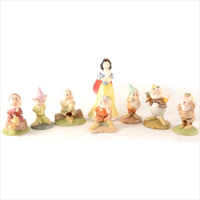 Lot 16 - Eleven Royal Doulton 'Snow White and Seven Dwarfs Collection' figures, all boxed.
