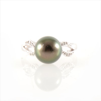 Lot 291 - A Tahitian pearl and diamond ring.