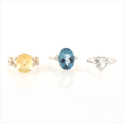 Lot 256 - Three gemset rings.