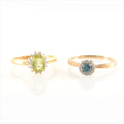 Lot 252 - Two green stone cluster rings.