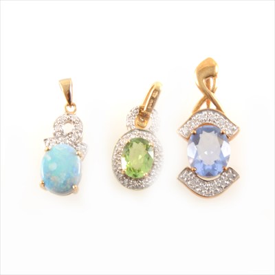 Lot 270 - Three gemset pendants.