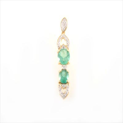 Lot 313 - An emerald and diamond pendant drop.