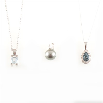 Lot 275 - A Tahitian pearl and diamond pendant, and two other gemset pendants with chains.