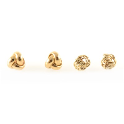 Lot 328 - Two pairs of gold knot earrings.