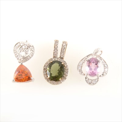 Lot 269 - A pink topaz and diamond pendant and two other gemset pendants.