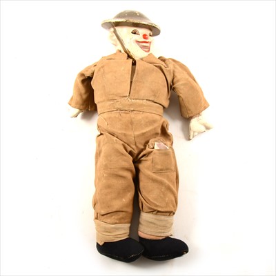 Lot 107 - WW2 Tommy doll, in soldiers outfit with composition head and hands, 34cm (a/f).