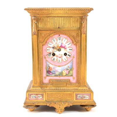 Lot 395 - A Louis XVI style gilt metal and Sevres style Rose Pompadour mantel clock, 19th Century