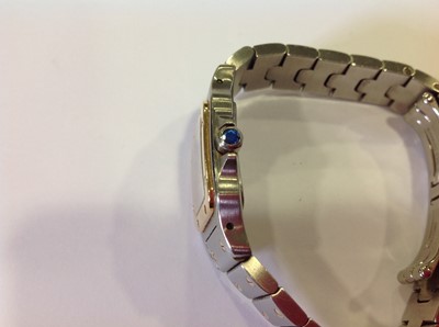 Lot 149 - Cartier - a lady's Santos bi-colour bracelet watch.
