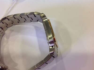 Lot 149 - Cartier - a lady's Santos bi-colour bracelet watch.