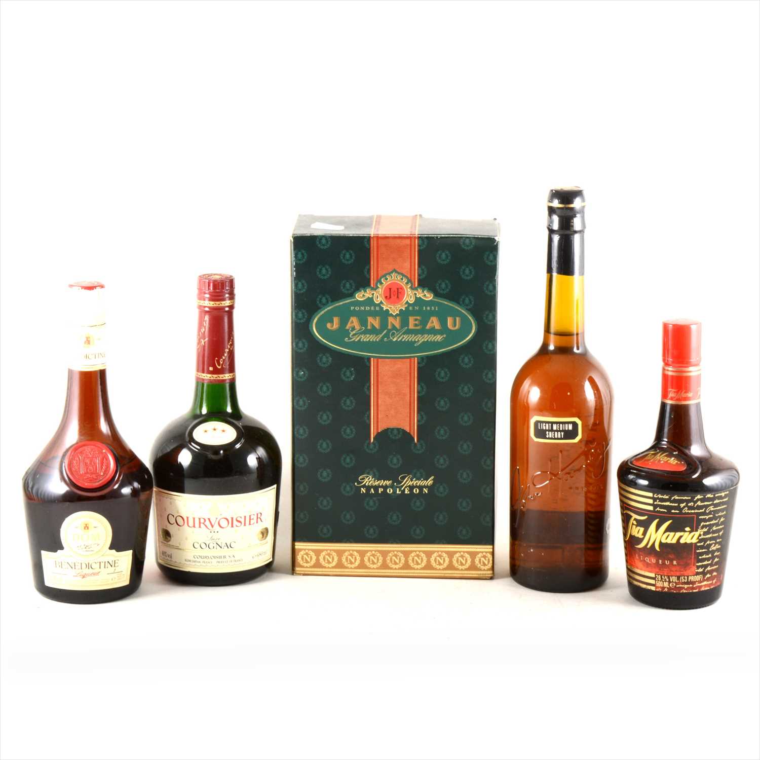 Lot 103 Nine bottles of liqueurs and brandy.