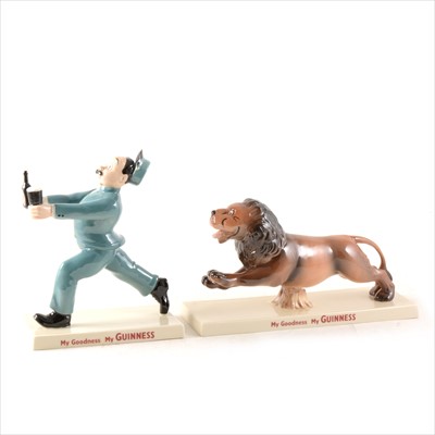 Lot 24 - Two Coalport Guinness figures, Zoo Keeper, 19cm, and Lion; ...
