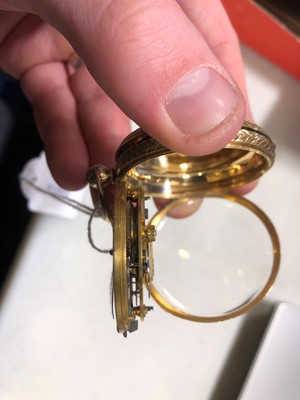 Lot 195 - An 18 carat yellow gold small open face pocket watch.