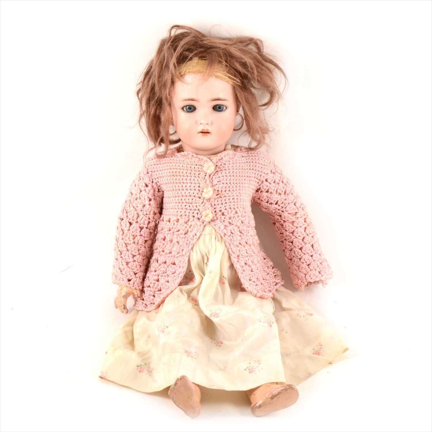 Lot 134 - A Kammer & Reinhardt / Simon and Halbig bisque head doll, with composition body, sleeping eyes and opened mouth, with pierced ears, 46cm.