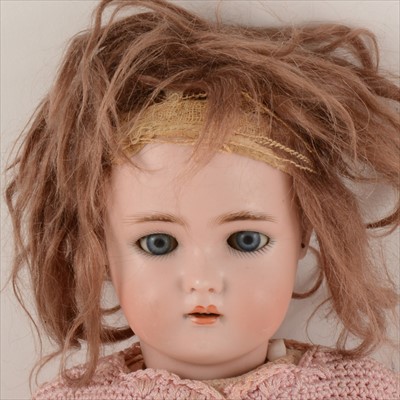 Lot 134 - A Kammer & Reinhardt / Simon and Halbig bisque head doll, with composition body, sleeping eyes and opened mouth, with pierced ears, 46cm.