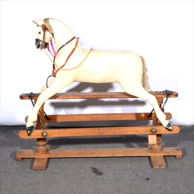 Lot 146 - Line Bros Tri-ang rocking horse, on stand, white painted body, 133cm ful length of stand.