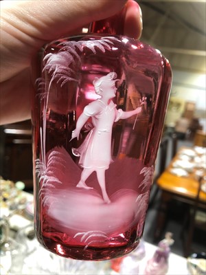 Lot 26 - A cranberry glass liqueur jug, and seven similar tumblers...