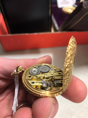 Lot 190 - A small yellow metal demi hunter pocket watch.