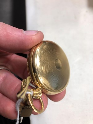 Lot 194 - A small 18 carat yellow gold small open face pocket watch