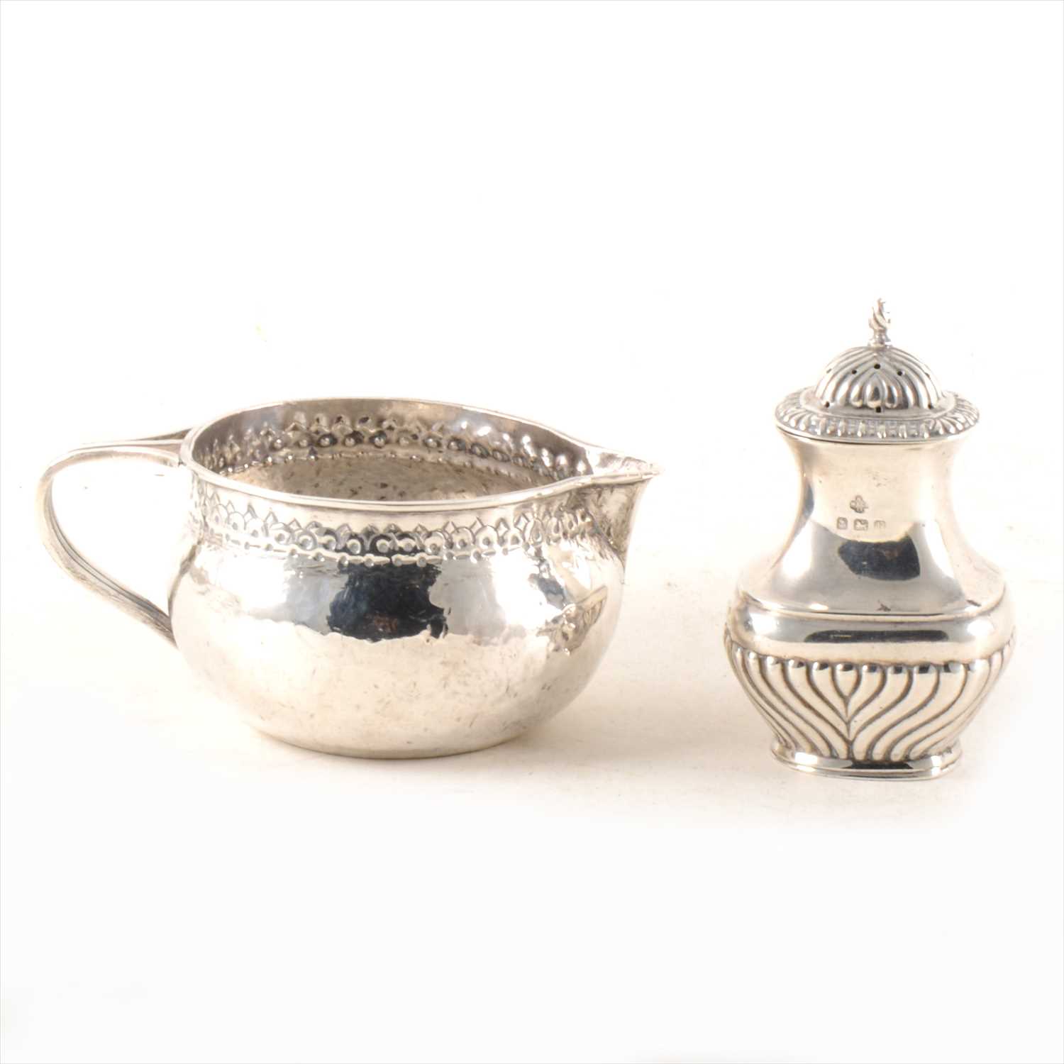 Lot 271 - An Arts & Crafts white metal jug, ...