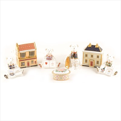 Lot 62 - Royal Crown Derby four Bear paperweights and two cottages, trinket box - boxed