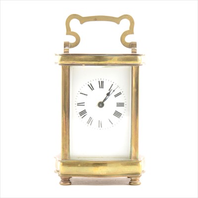 Lot 172 - French brass carriage clock, serpentine case