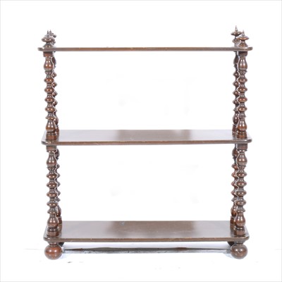 Lot 467 - A set of stained wood three-tier wall shelves