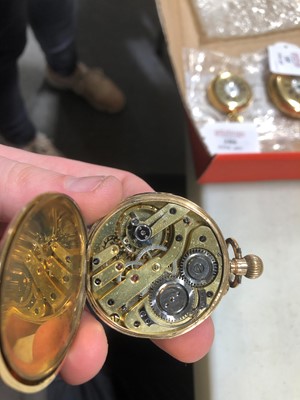 Lot 182 - A small yellow metal open face pocket watch.