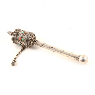 Lot 367 - White metal Tibetan Buddhist prayer wheel set with turquoise and coral cabochons.