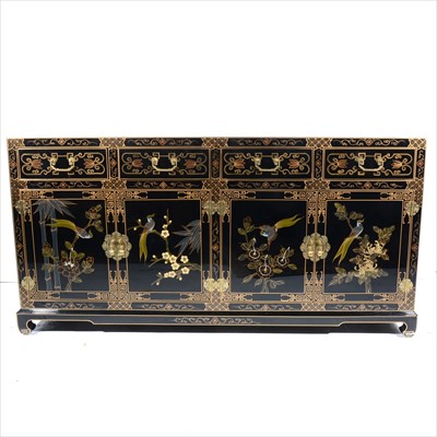 Lot 344 - A Far Eastern black lacquered sideboard