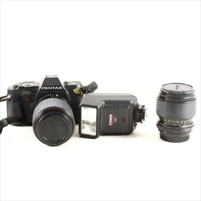 Lot 138 - Pentax P30 camera, lenses, filter, etc.